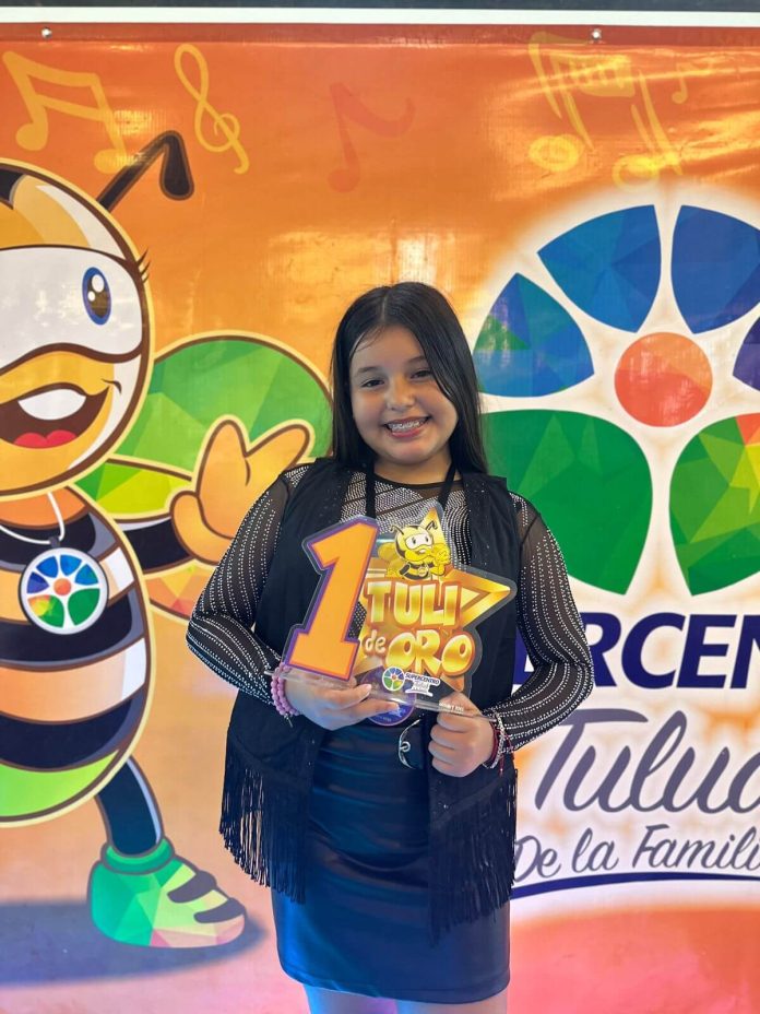 TANNY en el Tuli de Oro durante su presentación en Tuluá, donde cautivó al público con talento y emoción.